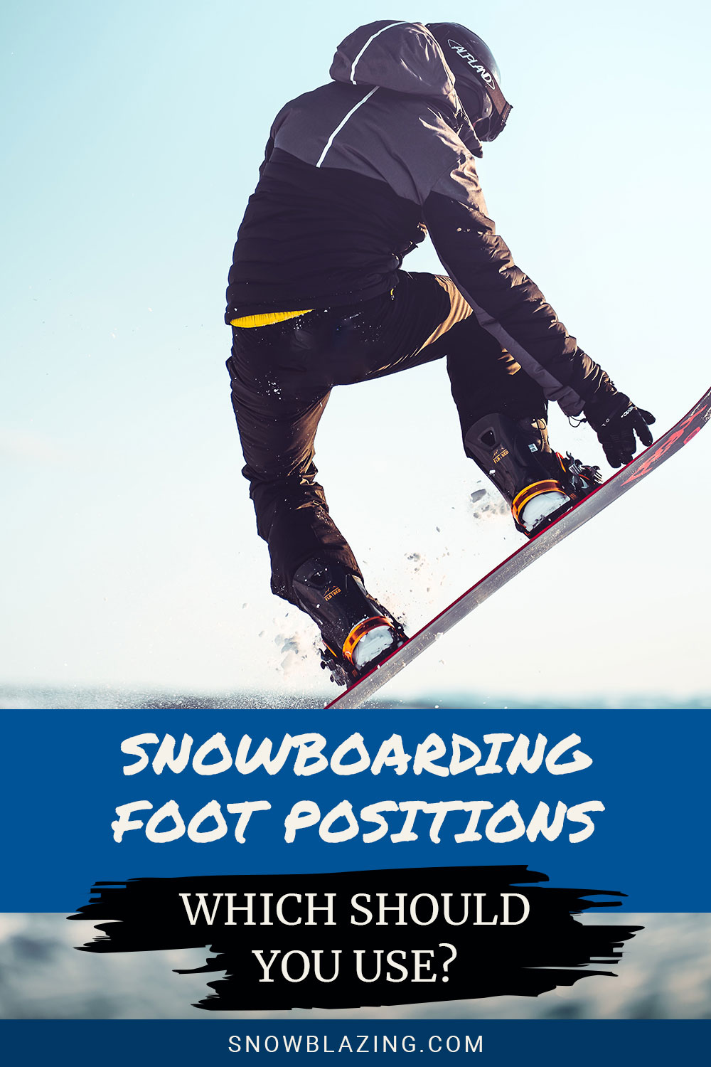 Man snowboarding up in the air - Snowboarding Foot Positions - Which Should You Use?