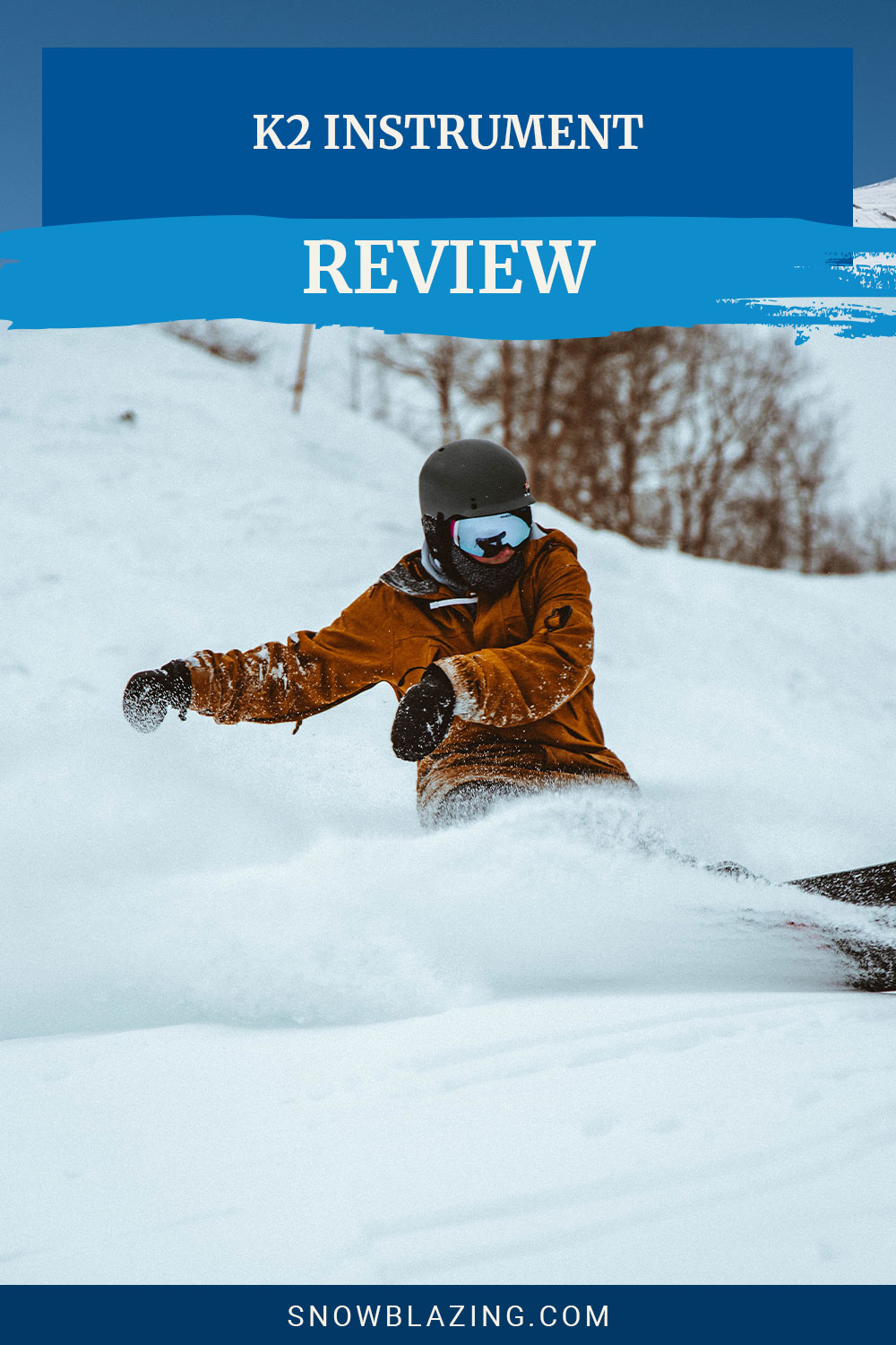 Person in a brown jacket snowboarding - K2 Instrument Review
