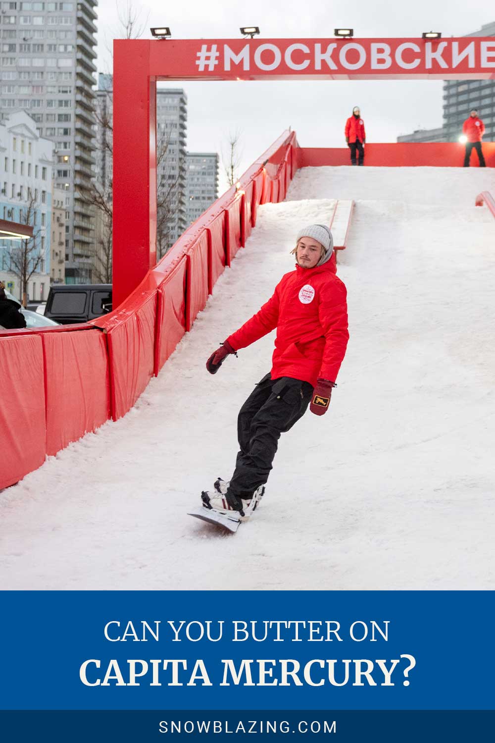 Guy wearing red jacket and black pants snowboarding - Can You Butter On Capita Mercury?