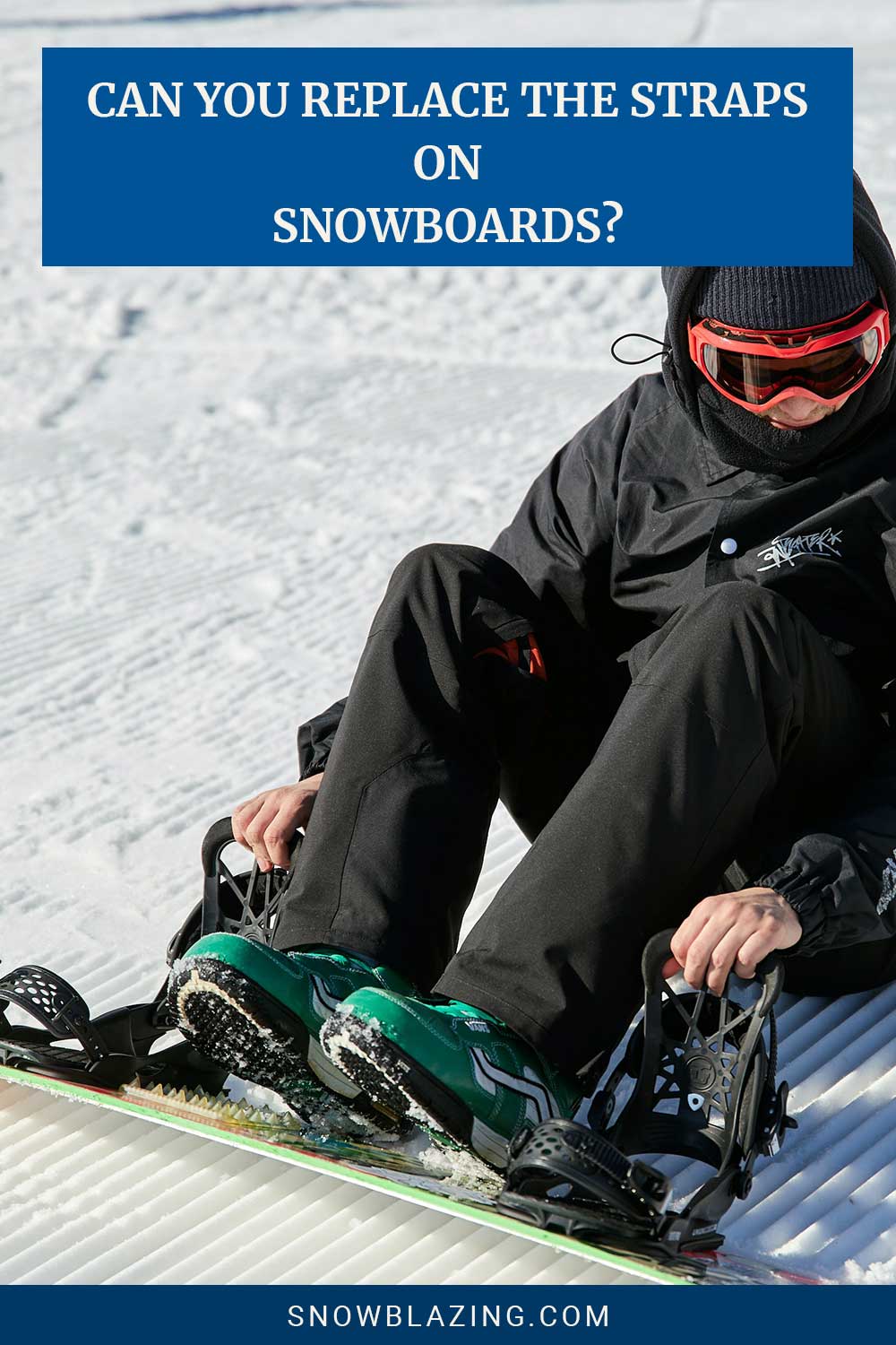 Man sitting and holding the bindings of a snowboard - Can You Replace The Straps On Snowboards?