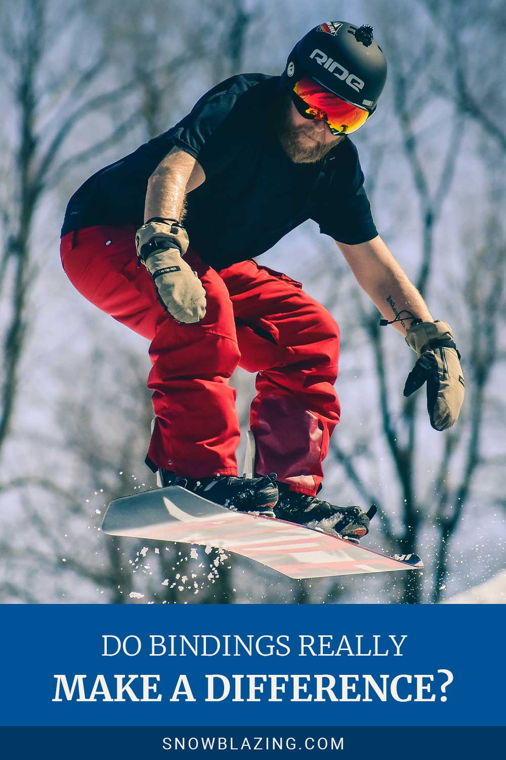 Man in black t-shirt jumping on a snowboard - Do Bindings Really Make A Difference?